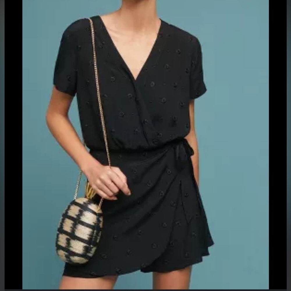 Anthropologie
 Embellished black Onesie/romper size small